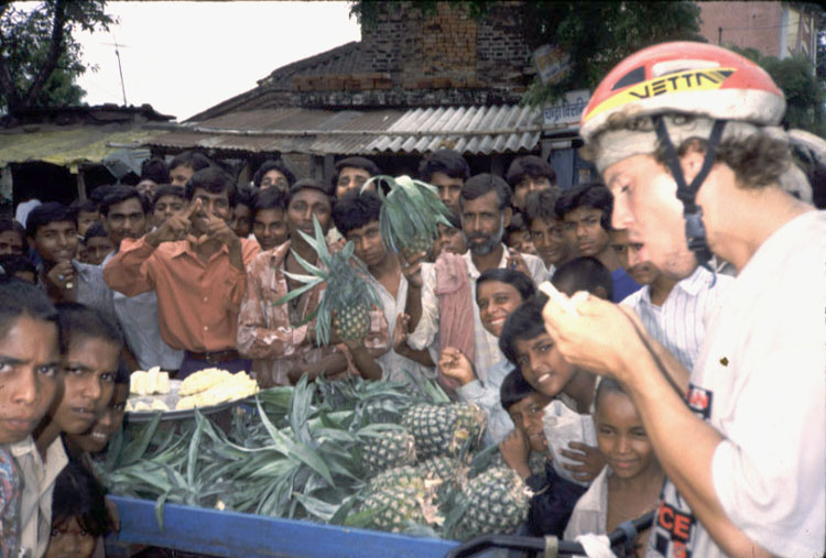 Eating pineapple outside Katmandu.